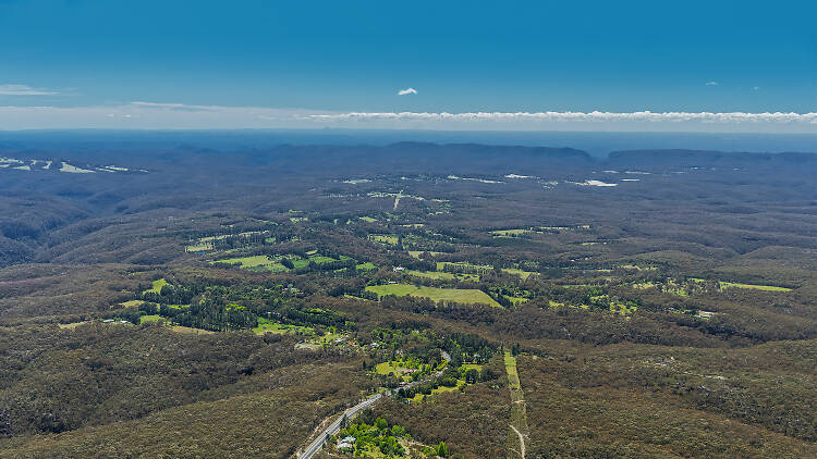 Aerial view of the town of Bilpin in the Hawkesbury with views towards Gardens of Stone National Park.