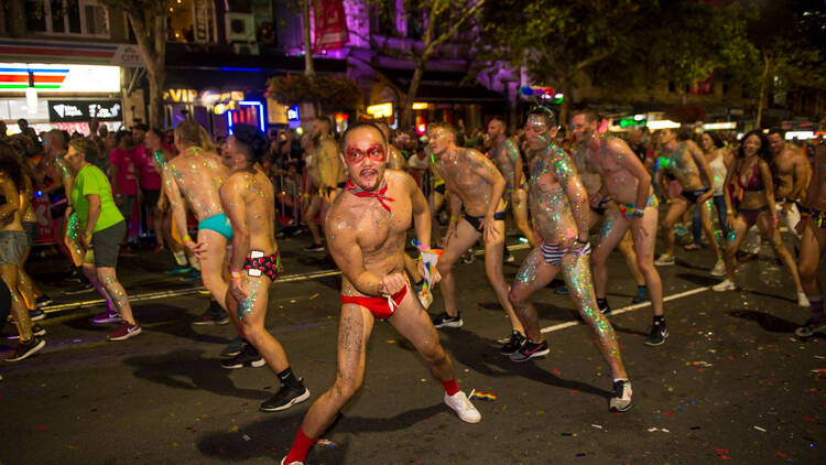 People dancing in underwear at Mardi Gras parade 2018