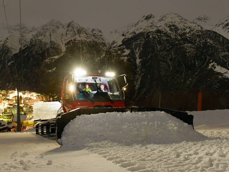 Hop in a PistenBully and get shovelling