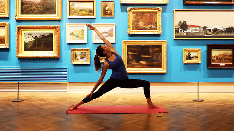 Woman doing yoga in the State Library