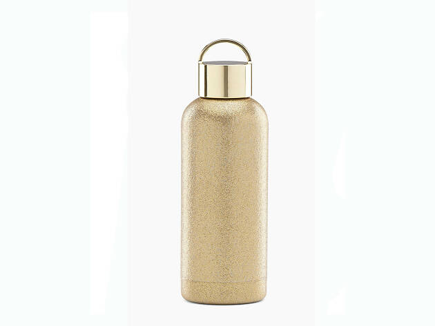 Termo para café dorado y con brillos El termo para café de Kate Spade
