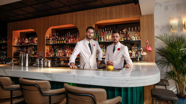 Bartenders in double-breasted dinner jackets at Maybe Sammy