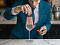 Bartender making a drink.