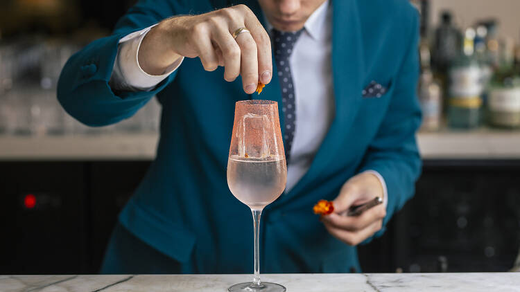 Bartender making a drink.