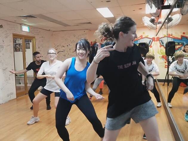 Crossover Dance Studios People dancing in a mirrored room.