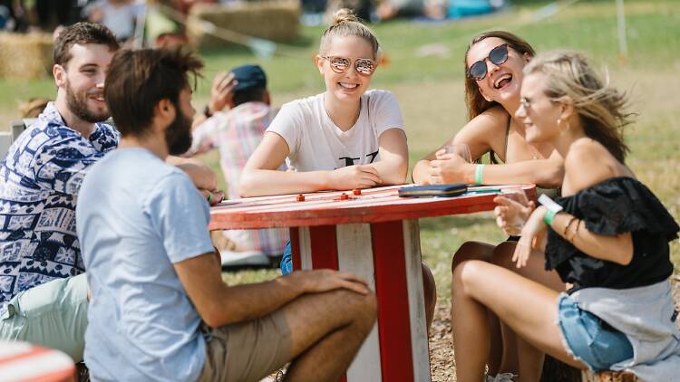 Peninsula Picnic, people drinking at a table