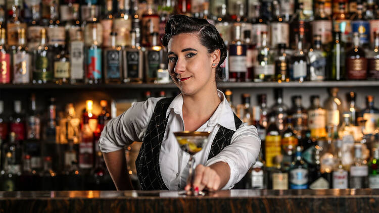 Portrait shot of Jessica Clayfield, Gin Palace behind the bar