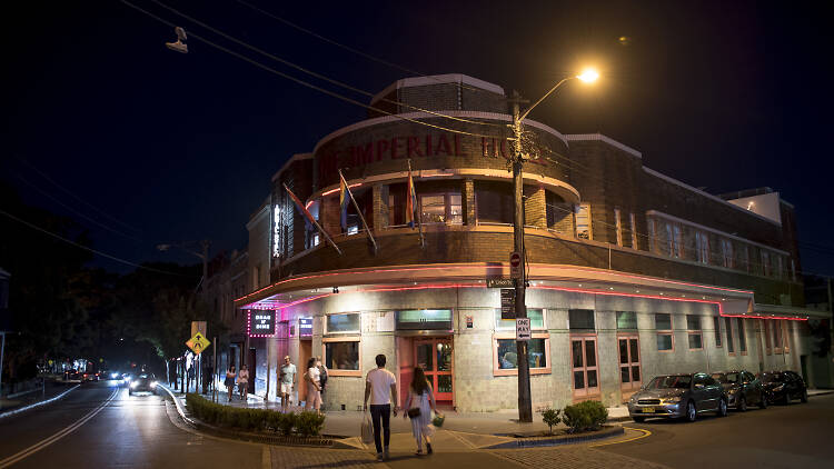 People walking outside the Imperial Hotel Erskineville