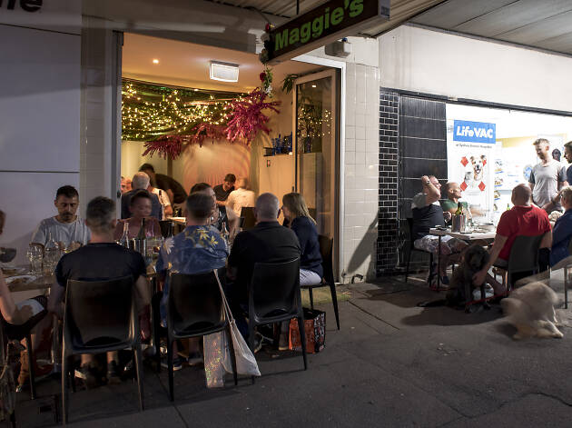 Erskineville at night, people sitting outside Maggie's People sitting outside a restaurant in Erskineville