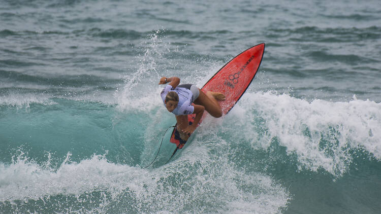 Person surfing at the Vissla Sydney Surf Pro.