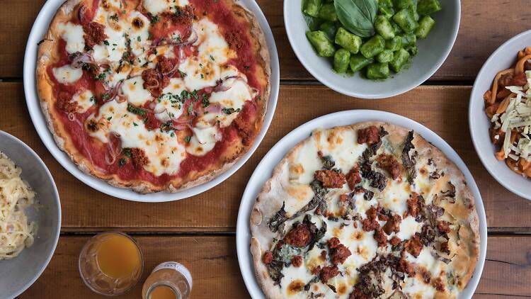 Gluten free pizzas and gnocchi on a table