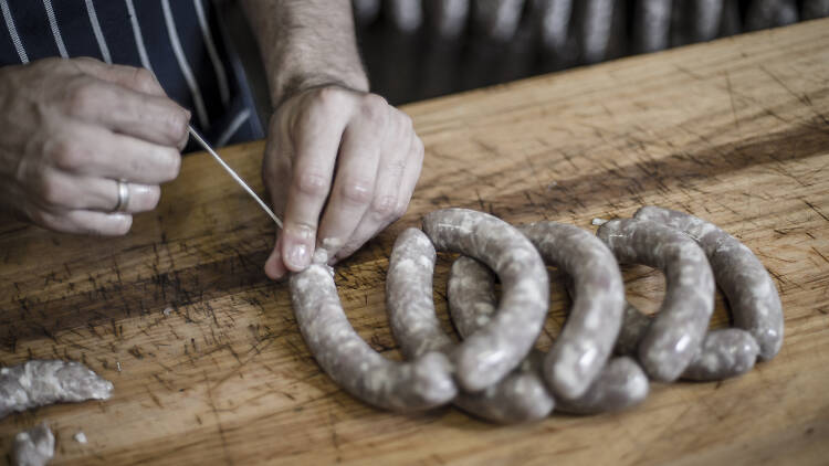 Person making sausages