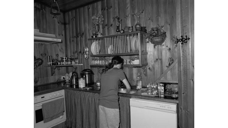 Emma Phillips, 'Diane washing dishes at her father's house'.