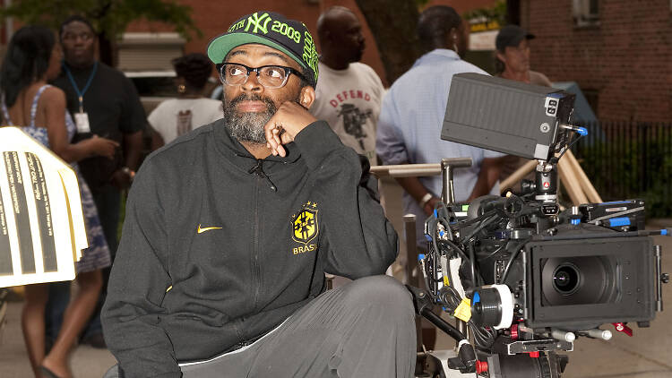 Spike Lee at a camera directing.