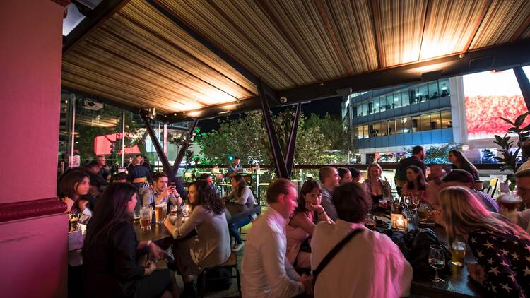 People sitting inside at Kings Cross Hotel