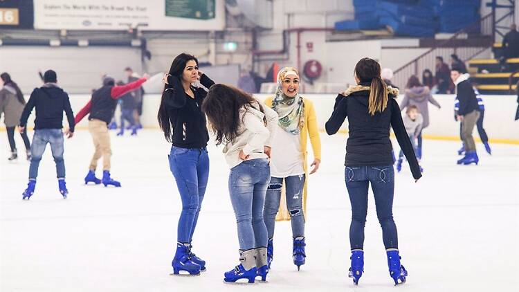 People skating on the ice.