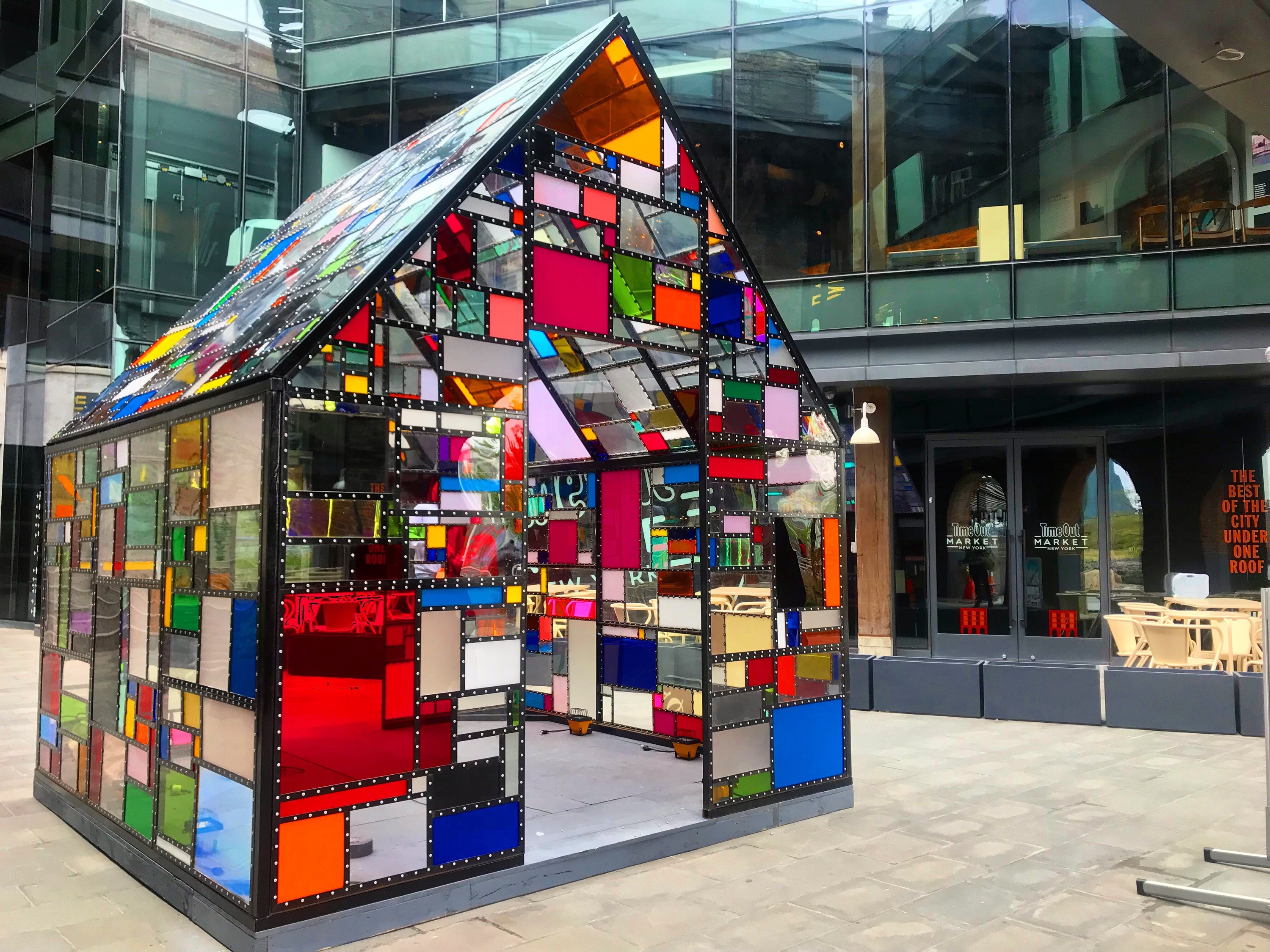 Flipboard Artist Tom Fruin has installed a multicolored glass house