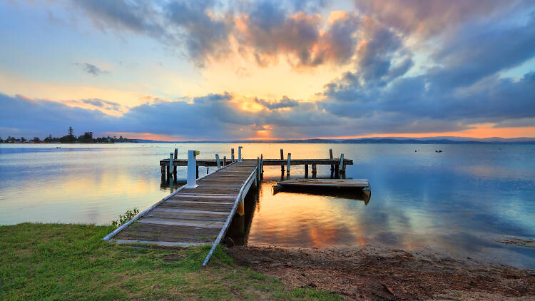 Sunset at Belmont, Lake Macquarie over a jetty.