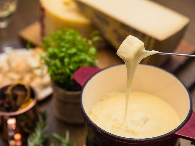 Cheese fondue at Swissotel A pot of cheese fondue being eaten