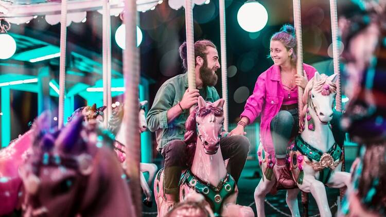 Dating couple on a carousel