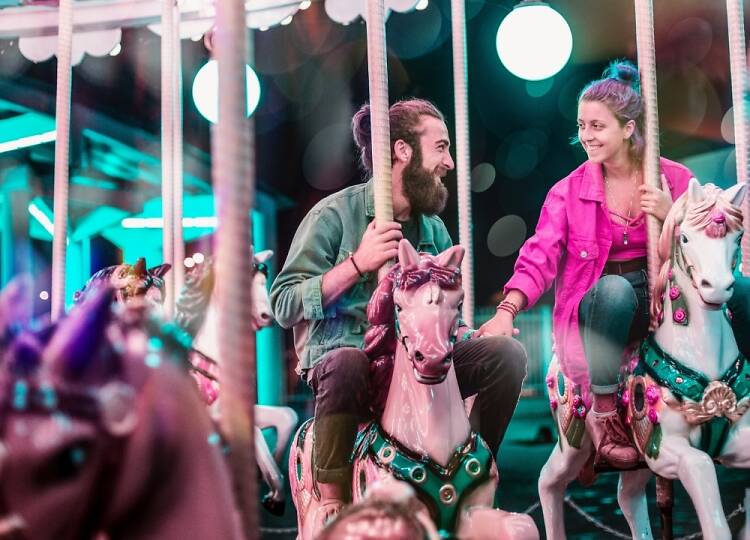 Dating couple on a carousel