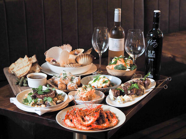 Darlings Bistro A selection of share plates and bottles of wine