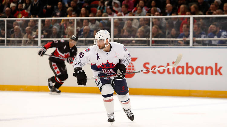 An ice hockey player during the Ice Hockey Classic.