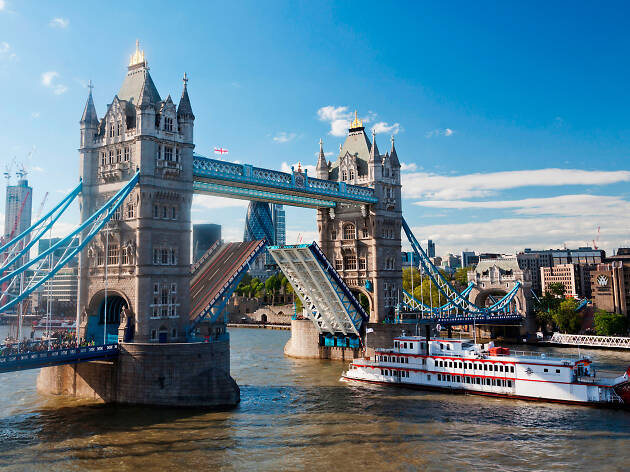 Tower Bridge opens for a passing boat