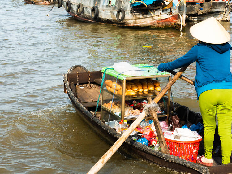 Shop by boat at Cai Rang Floating Market