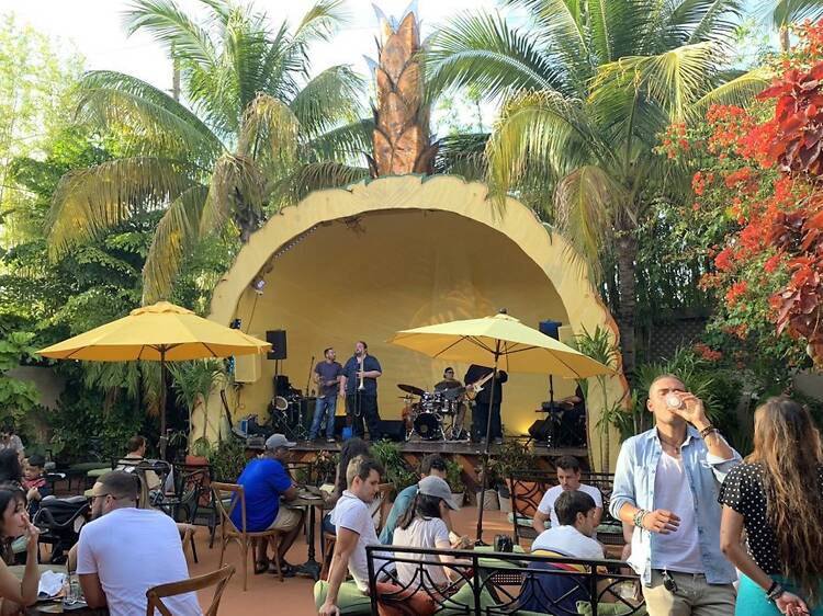 Watch live salsa from a pineapple-shaped stage at Ball & Chain