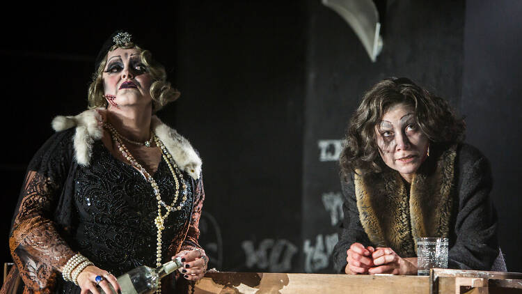 Two women dressed in elaborate make-up as part of the Razorhurst play.