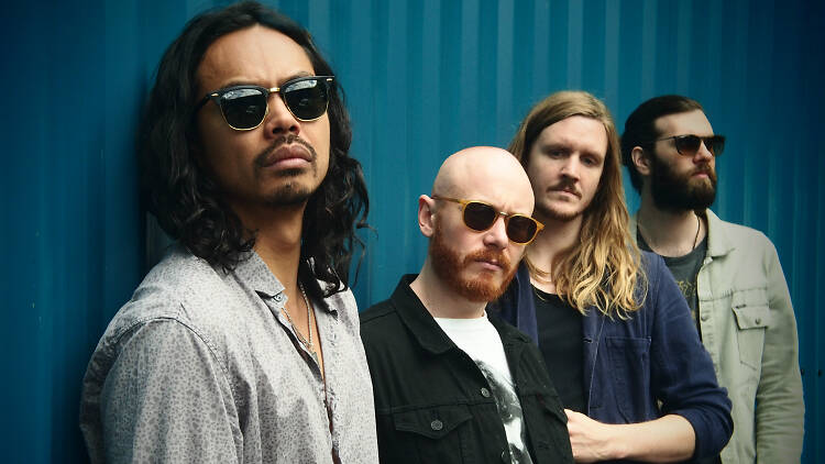 Press shot of the Temper Trap against a blue background