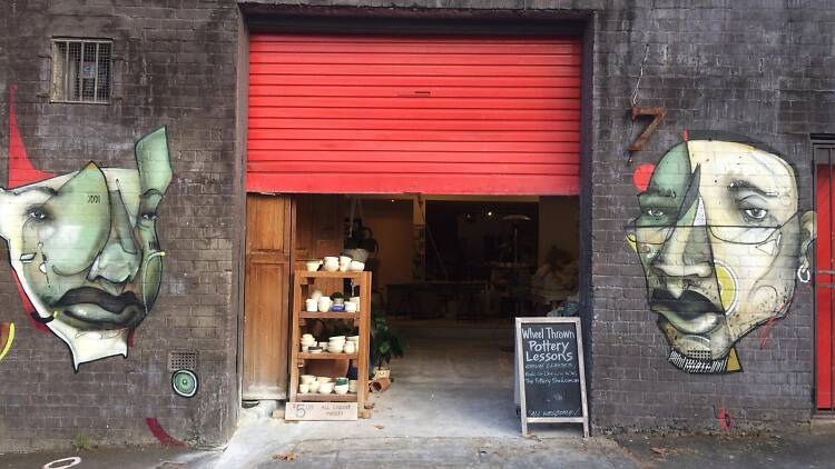 Entrance to the Pottery Shed with colourful art.