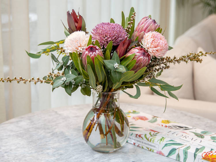 Native flowers in a vase with a Floraly letterbox gift box