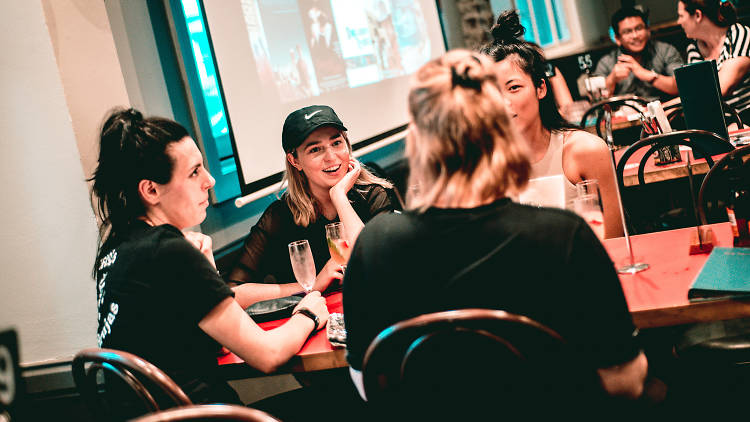 People sitting at tables at the Toxteth Hotel.