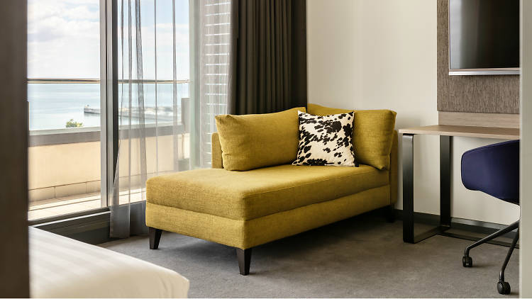 A yellow chaise lounge