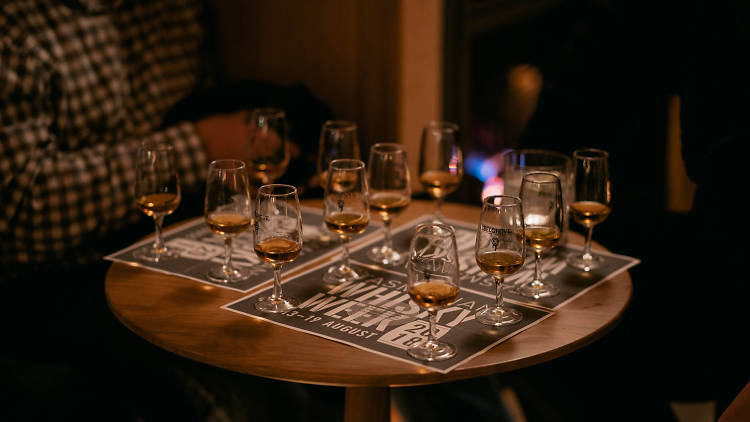 A table covered in whisky tastings