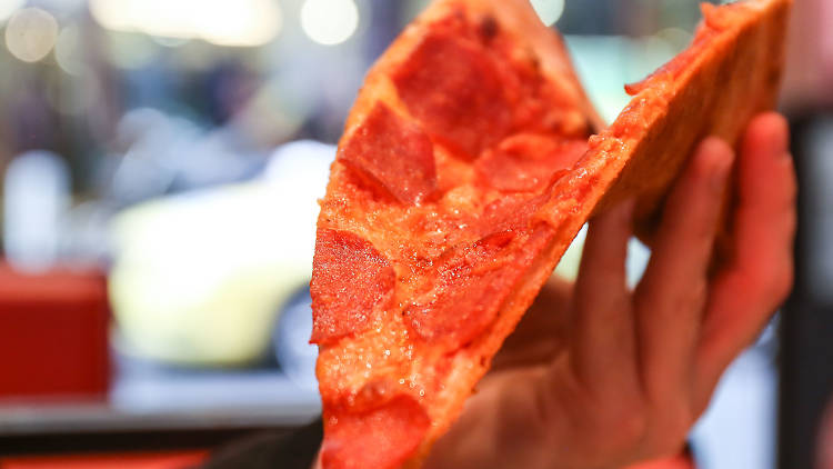 Slice of pizza at Sal's Authentic New York Pizza