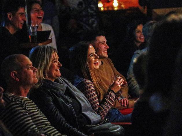 Crab Lab People in crowd laughing at comedy at Crab Lab