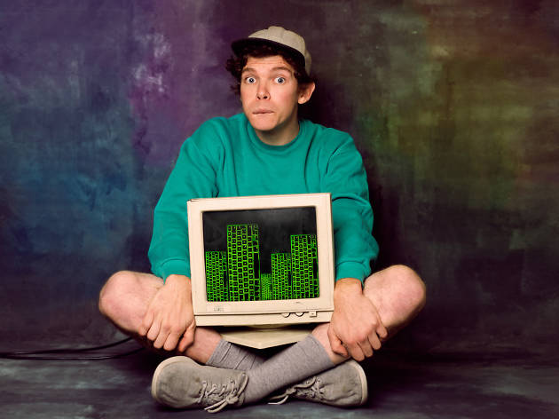 Tröll Actor from theatre show Tröll sits with a computer screen