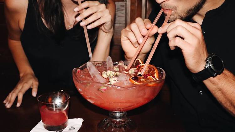 Share a gigantic cocktail at Spicehaus