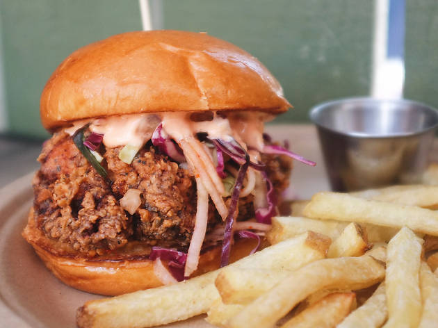 Long Beach’s new tiki bar serves a Thai tea chicken sandwich so good, it’s worth braving rush hour Thai tea fried chicken sandwich at Long Beach tiki bar Bamboo Club