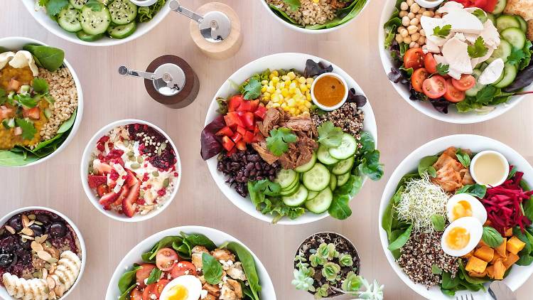 An overhead shot of breakfast and lunch bowls at Bliss Bowls