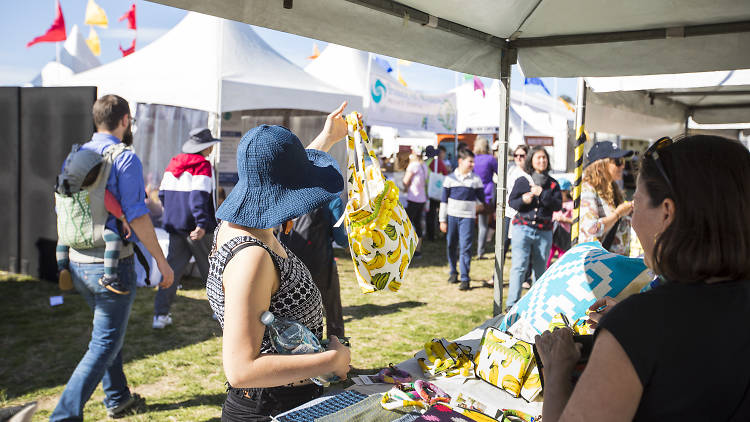 People at the markets at the Eco Living Expo.