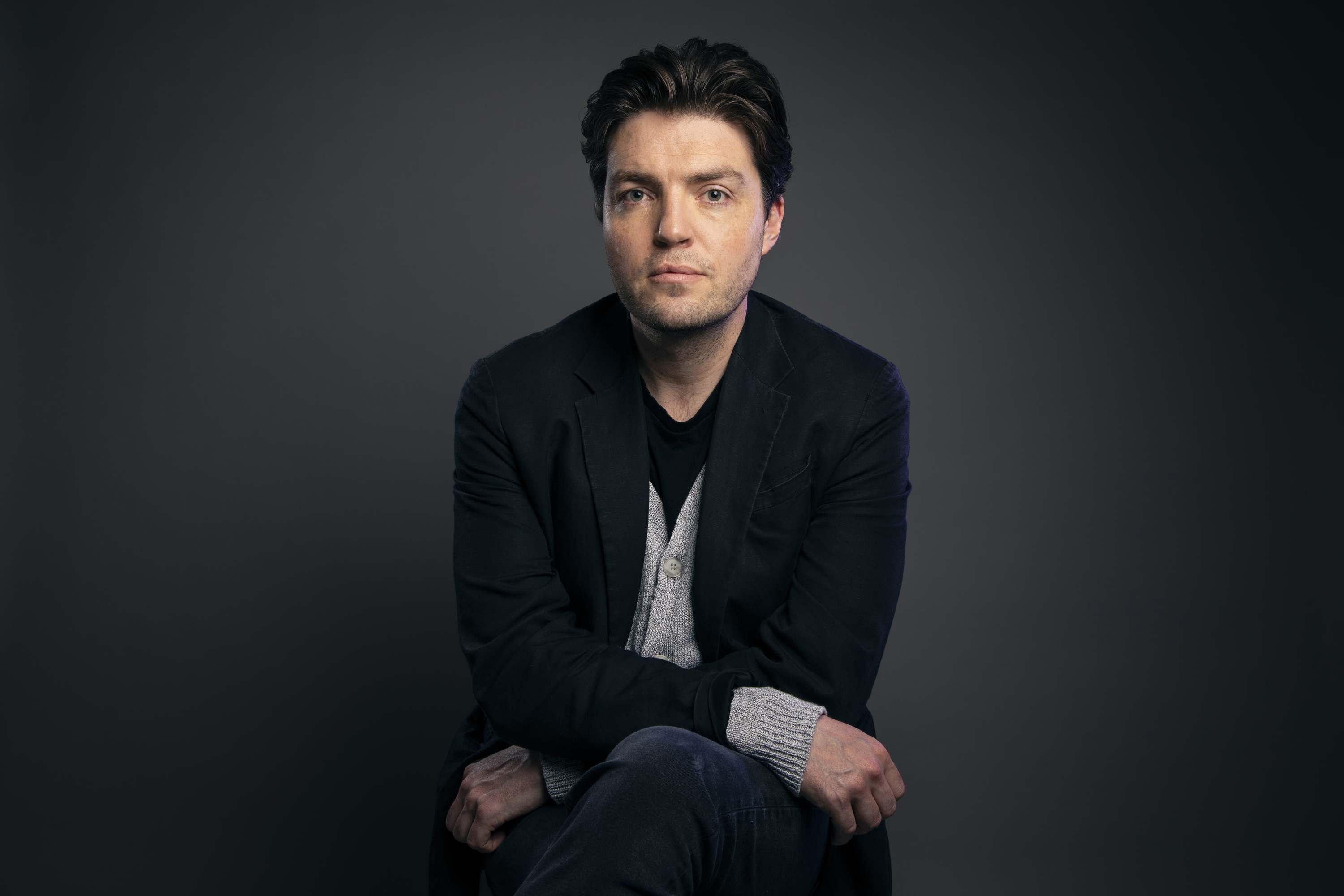 Tom Burke On The Souvenir, Strike and Learning From Alan Rickman