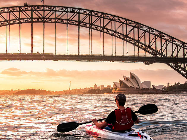 Generic man in kayak on Sydney Harbour Generic man in kayak on Sydney Harbour