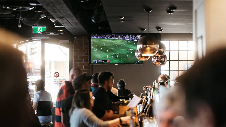 People watching football at the Duke