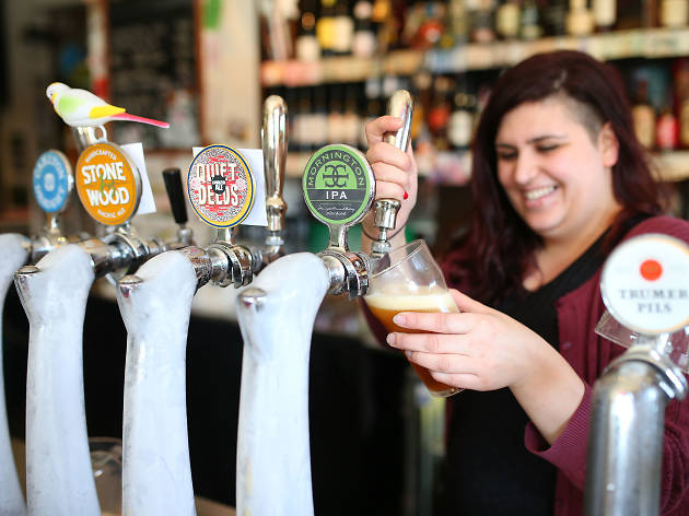 The Palace Hotel South Melbourne Bartender pouring a beer