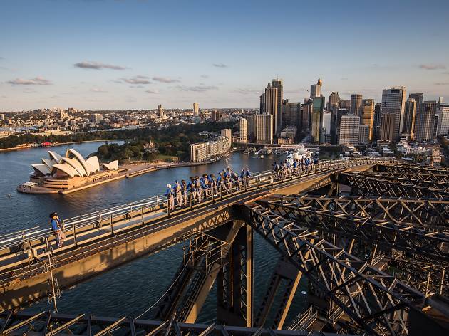 The Sydney Harbour BridgeClimb A group reach the peak of Sydney Harbour BridgeClimb