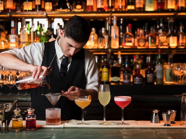 Person making cocktails at Little Felix